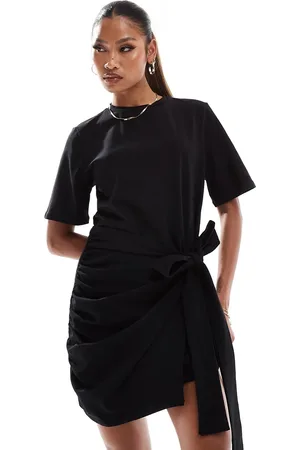In The Style Vestido corto estilo camiseta con diseño cruzado y lazada lateral exclusivo de