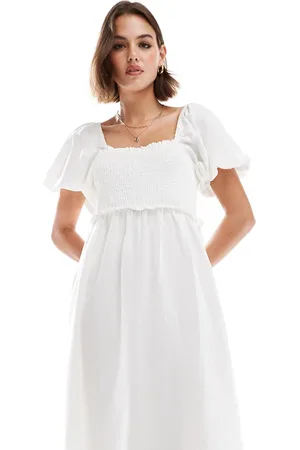 New Look Vestido midi hueso con cintura fruncida y mangas abullonadas de