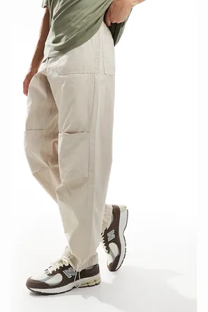 SELECTED Pantalones color sueltos con cinturilla elástica de tejido antidesgarros de -Beis neutro