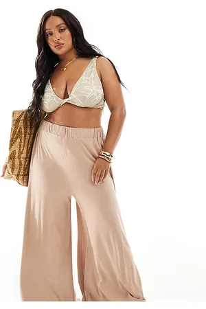 ASOS Pantalones playeros color de corte palazzo de punto de Curve-Negro