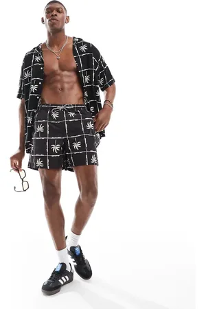 JACK & JONES Shorts de baño negros con estampado de cuadrícula con palmeras de (parte de un conjunto)