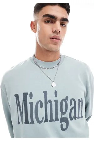 ASOS Sudadera lavado extragrande con texto estampado de