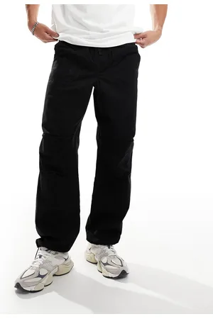 SELECTED Pantalones negros sueltos con cinturilla elástica de tejido antidesgarros de