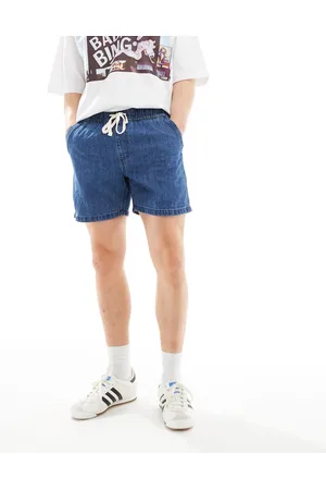 Cotton On Pantalones cortos azul añil cómodos con lavado a la piedra medio y cordón ajustable de Cotton On