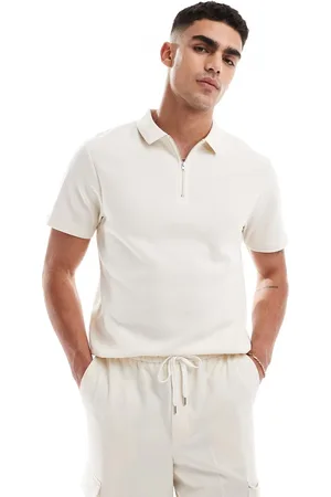 ASOS Polo color crudo con cremallera al cuello de punto gofrado de -Blanco