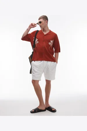 Topman Polo color óxido con bordado floral de -Naranja