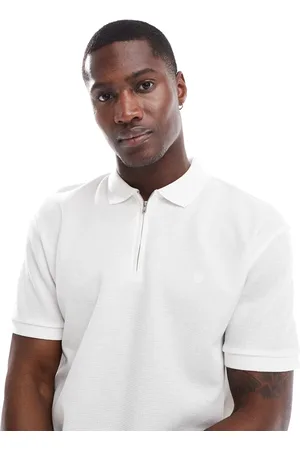 JACK & JONES Polo blanco con cremallera y acabado texturizado de Premium