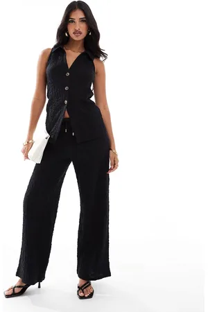 River Island Pantalones negros de pernera ancha de tejido texturizado de (parte de un conjunto)