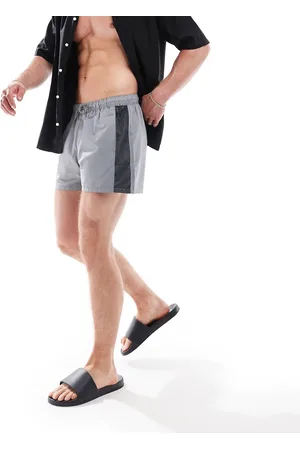 ASOS Shorts de baño cortos con paneles de malla de