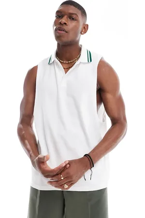 ASOS Camiseta blanca sin mangas holgada con cuello tipo polo de tejido de rizo de
