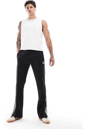 adidas Pantalones de chándal negros de corte acampanado Adicolor de