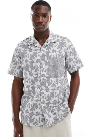 Paul Smith Camisa azul estampada con cuello de solapas y bolsillo de