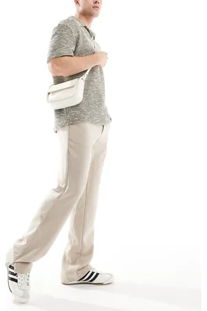 The Couture Club Pantalones con abertura en los bajos de - neutro