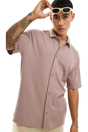 ASOS Polo rosa holgado con botones de