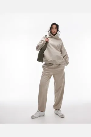 Topshop Joggers color con bajos ajustados y estampado gráfico Community de (parte de un conjunto)-Beis neutro