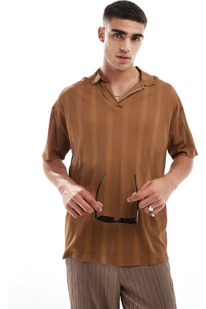 ASOS Polo extragrande con cuello de solapas de tejido texturizado de