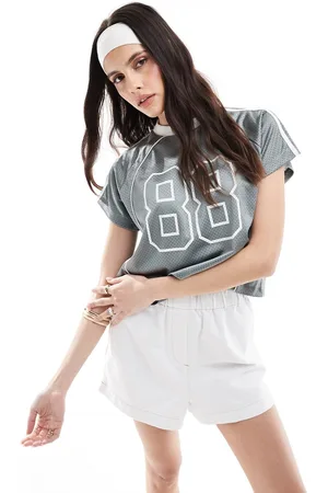 Miss Selfridge Camiseta corta de estilo fútbol americano con estampado gráfico de -Azul