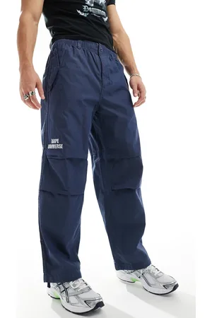 A Bathing Ape Pantalones azul apagado de estilo carpintero de