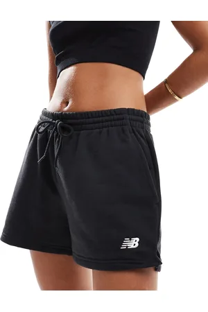 New Balance Pantalones cortos negros de felpa de rizo Sport Essentials de
