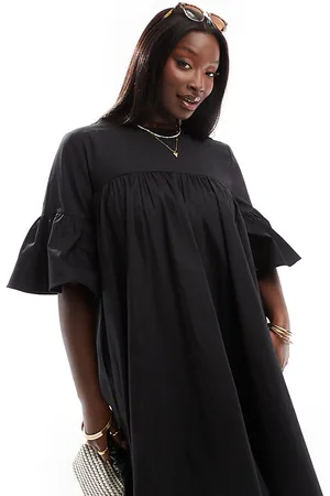ASOS Vestido corto extragrande de corte y mangas amplias de ASOS DESIGN Curve