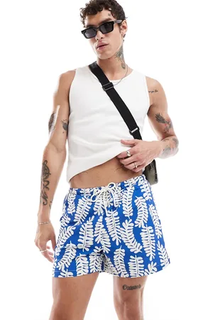 River Island Shorts de baño con estampado abstracto de hojas de
