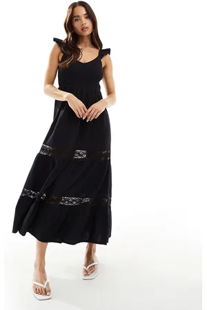 New Look Vestido midi con parte superior fruncida y diseño escalonado de