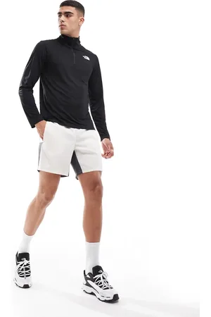 The North Face Top negro con cremallera corta y logo 24/7 de Training