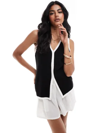 ASOS Chaleco largo con cuello de pico de punto de