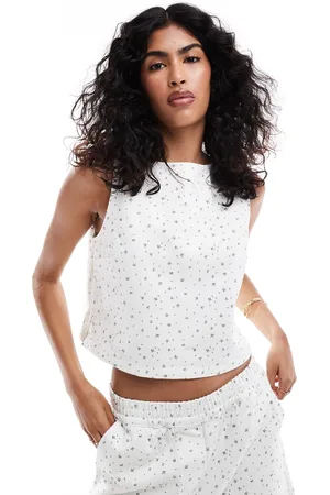 ASOS Top vaquero sin mangas con estampado de florecitas de