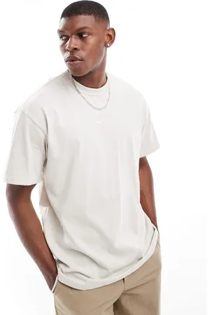 Nike Camiseta blanco hueso unisex extragrande de Premium Essentials