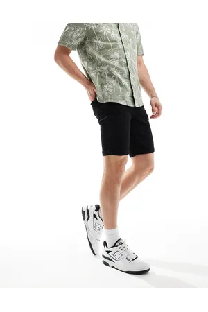 River Island Pantalones cortos vaqueros ajustados negros de
