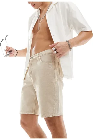 River Island Pantalones cortos vaqueros color de corte slim de -Beis neutro