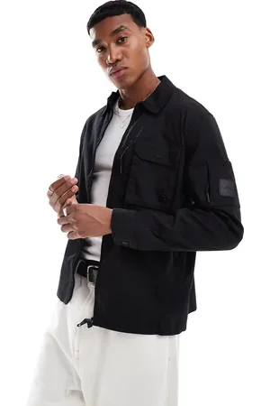 River Island Chaqueta negra estilo camisa utilitaria y técnica de