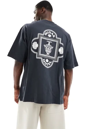 River Island Camiseta negra con diseño griego y texto "Midas Hotel" de