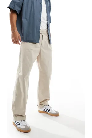 SELECTED Pantalones color piedra sueltos con bajos vueltos de -Beis neutro