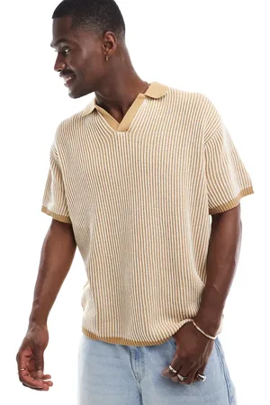 ASOS Polo color extragrande con muesca en el cuello de canalé plisado de -Beis neutro