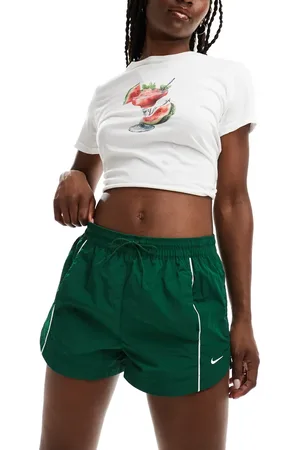 Nike Pantalones cortos verdes de tejido liso Windrunner de