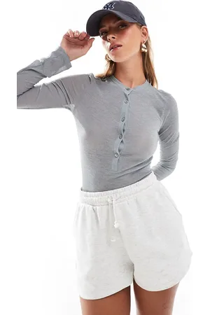 ASOS Body con cuello panadero de canalé transparente de