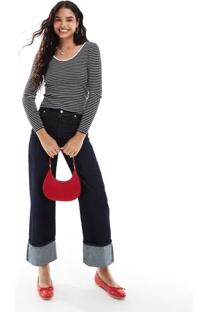 VERO MODA Camiseta negra y blanca a rayas de manga larga con diseño reversible de -Negro