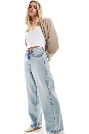 Miss Selfridge Vaqueros azules holgados con lavado ácido de