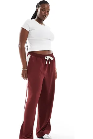 ASOS Pantalones sin cierres con panel en contraste de ASOS DESIGN Curve-Rojo