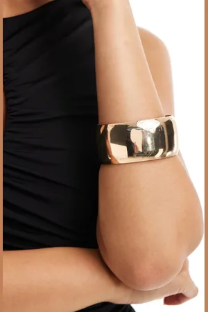 Kaiia Pulsera rígida dorada gruesa de