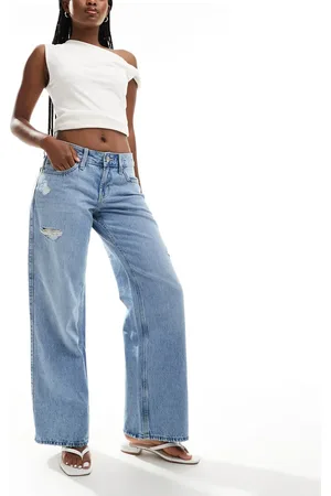 Hollister Vaqueros azul medio holgados de corte ancho y talle bajo con detalles rasgados de