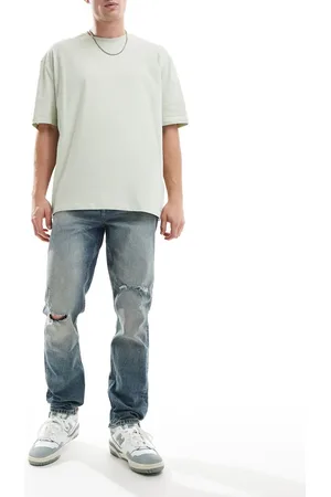 ASOS Vaqueros de corte slim en azul con lavado claro de