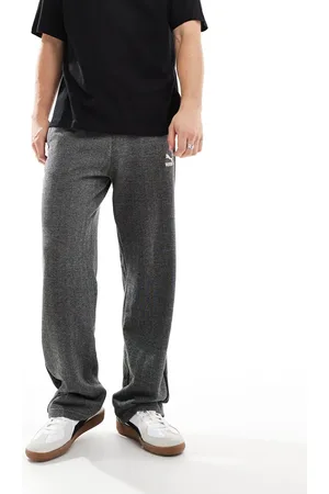 PUMA Pantalones de chándal con patrón de espiga T7 de