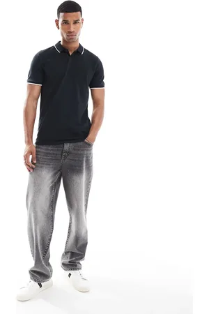 Hollister Polo negro con ribetes y logo de icono de piqué de