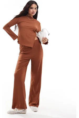 VILA Pantalones color óxido de pernera ancha de tejido elástico texturizado de (parte de un conjunto)-Naranja