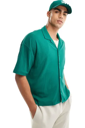 ASOS Polo verde extragrande abotonado de