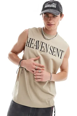 COLLUSION Camiseta color sin mangas extragrande con estampado "Heaven Sent" de -Beis neutro
