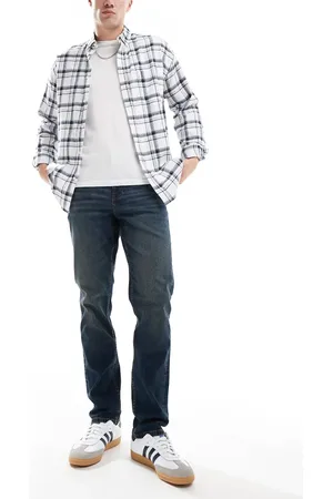 ASOS Vaqueros de corte slim con lavado oscuro tintado de -Azul